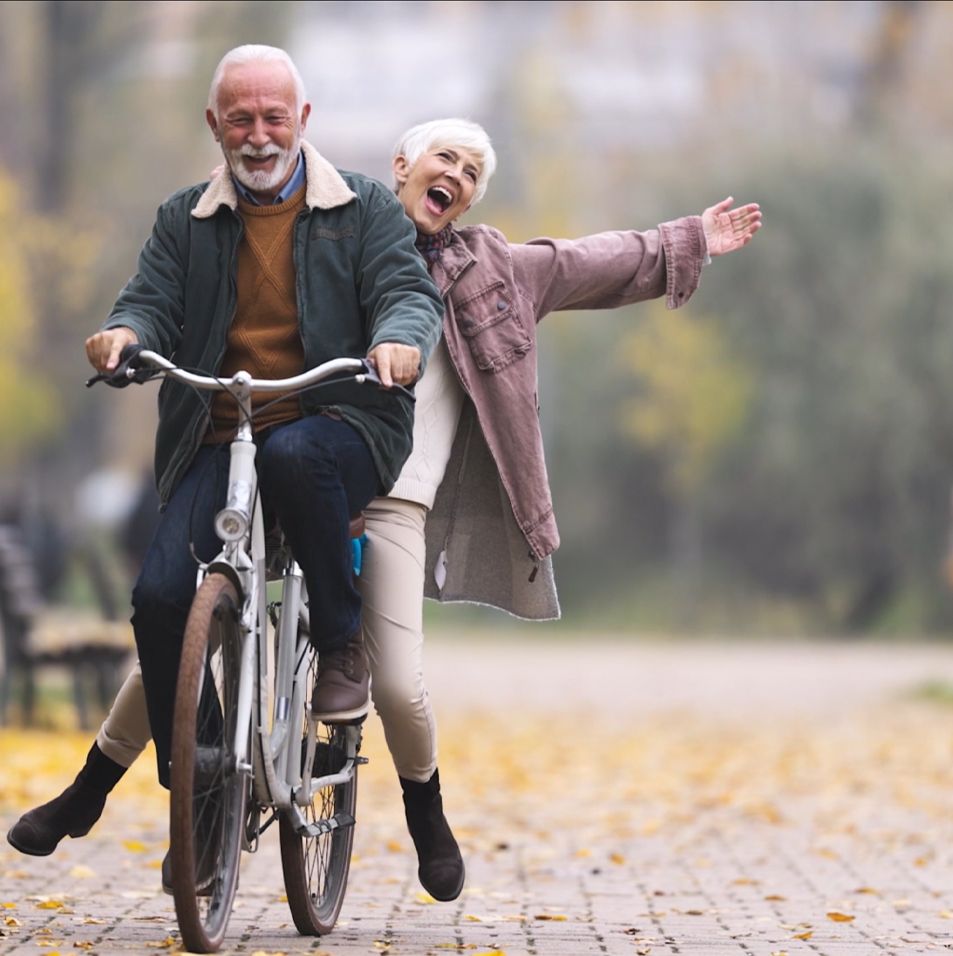 Couple riding a bicycle